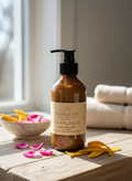 Pictured Rocks Petal body lotion bottle on styled surface | Spirit Led Creative Michigan

