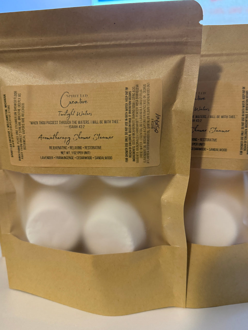 Small batch. Michigan Made. Spirit Led Creative. Shower Steamer pucks in natural paper packaging. 