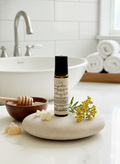 Close-up of aromatherapy roll-on essential oil blend for rest and presence | Spirit Led Creative